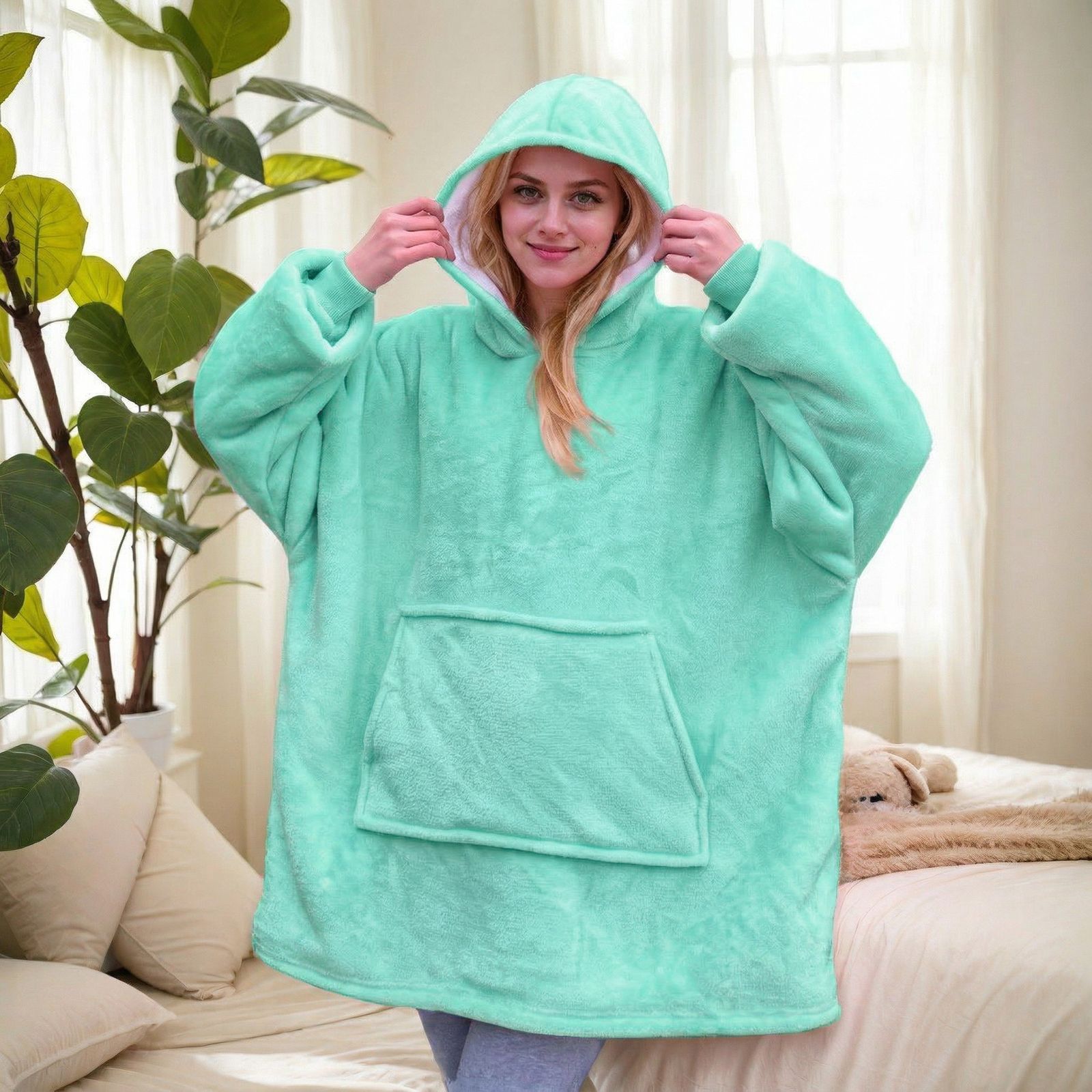 Teal hooded blanket with sherpa lining
